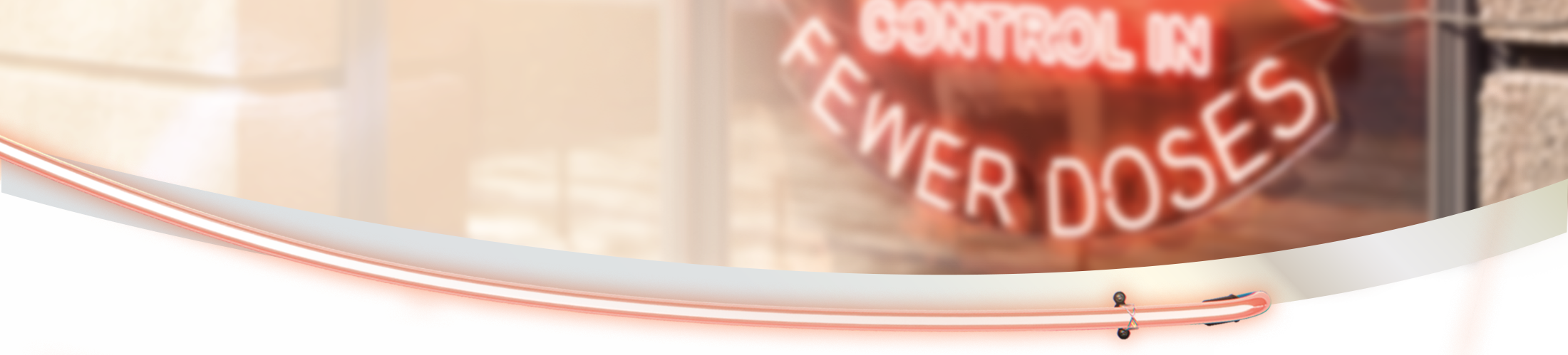 An upclose photo of a neon sign reading 'fewer doses'.