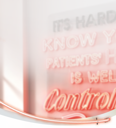An upclose photo of a neon sign reading 'Get HAE under control'.